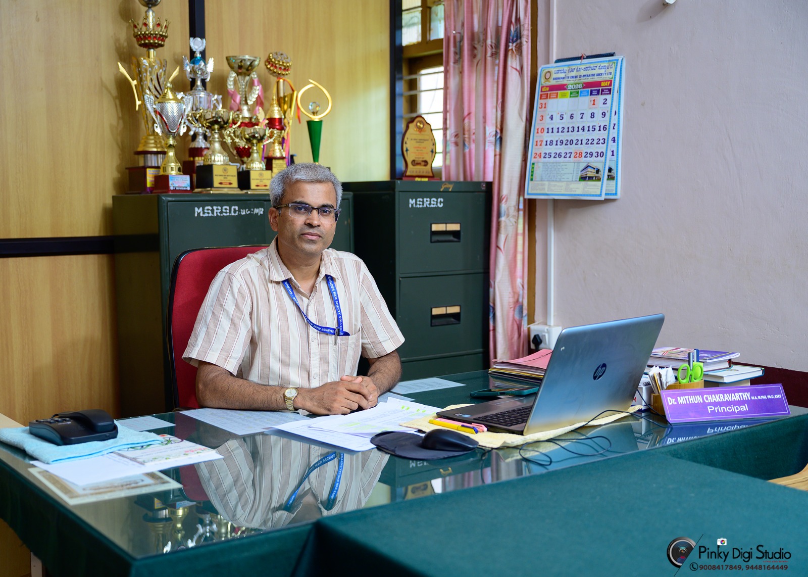Dr. Mithun Chakravarthy - Principal at his desk